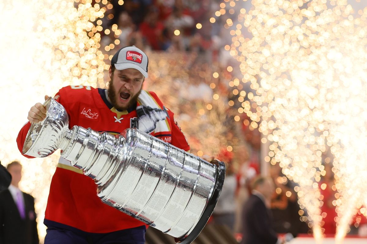 Jun 24, 2024; Sunrise, Florida, USA; Florida Panthers forward Aleksander Barkov (16) hoists the Stanley Cup after defeating the Edmonton Oilers in game seven of the 2024 Stanley Cup Final at Amerant Bank Arena. Mandatory Credit: Sam Navarro-Imagn Images