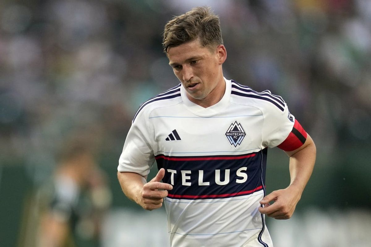 Jun 22, 2024; Portland, Oregon, USA; Vancouver Whitecaps FC midfielder Ryan Gauld (25) in action against the Portland Timbers during the first half at Providence Park. Mandatory Credit: Soobum Im-USA TODAY Sports