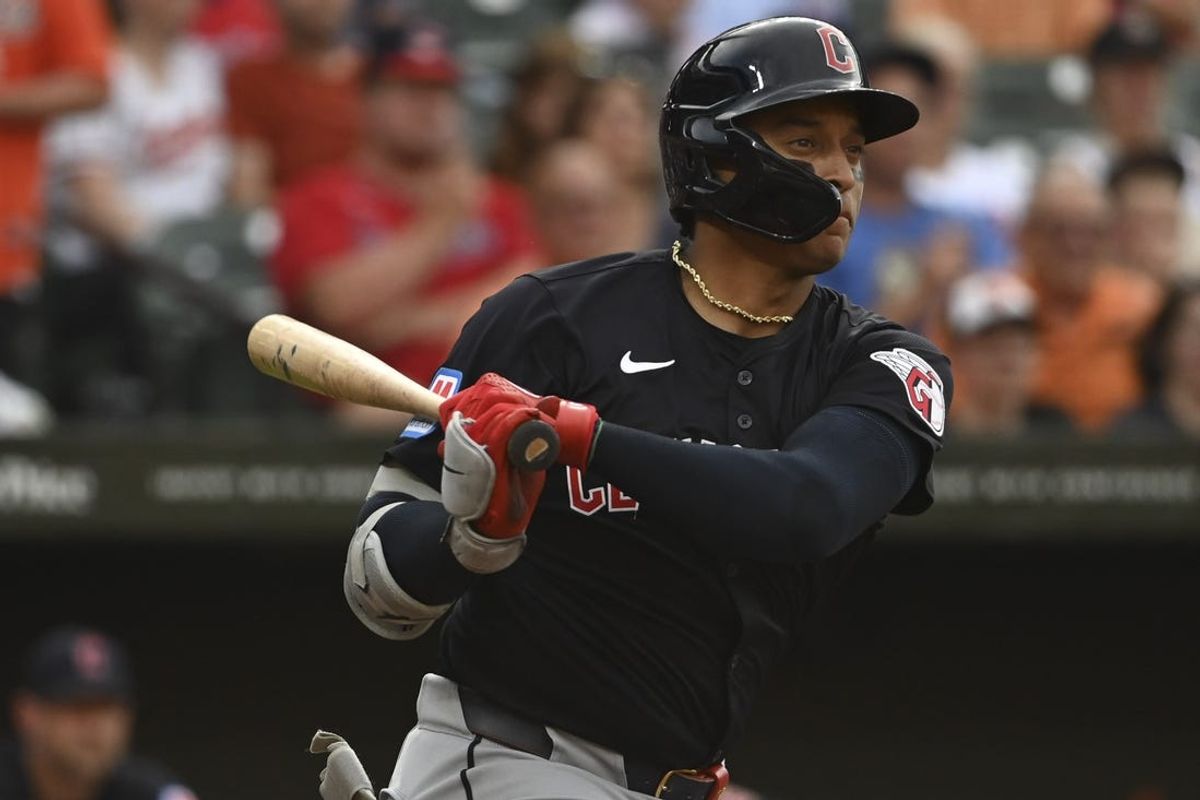 Jun 25, 2024; Baltimore, Maryland, USA; Cleveland Guardians catcher Bo Naylor (23) hits a second inning double against the Baltimore Orioles  at Oriole Park at Camden Yards. Mandatory Credit: Tommy Gilligan-USA TODAY Sports