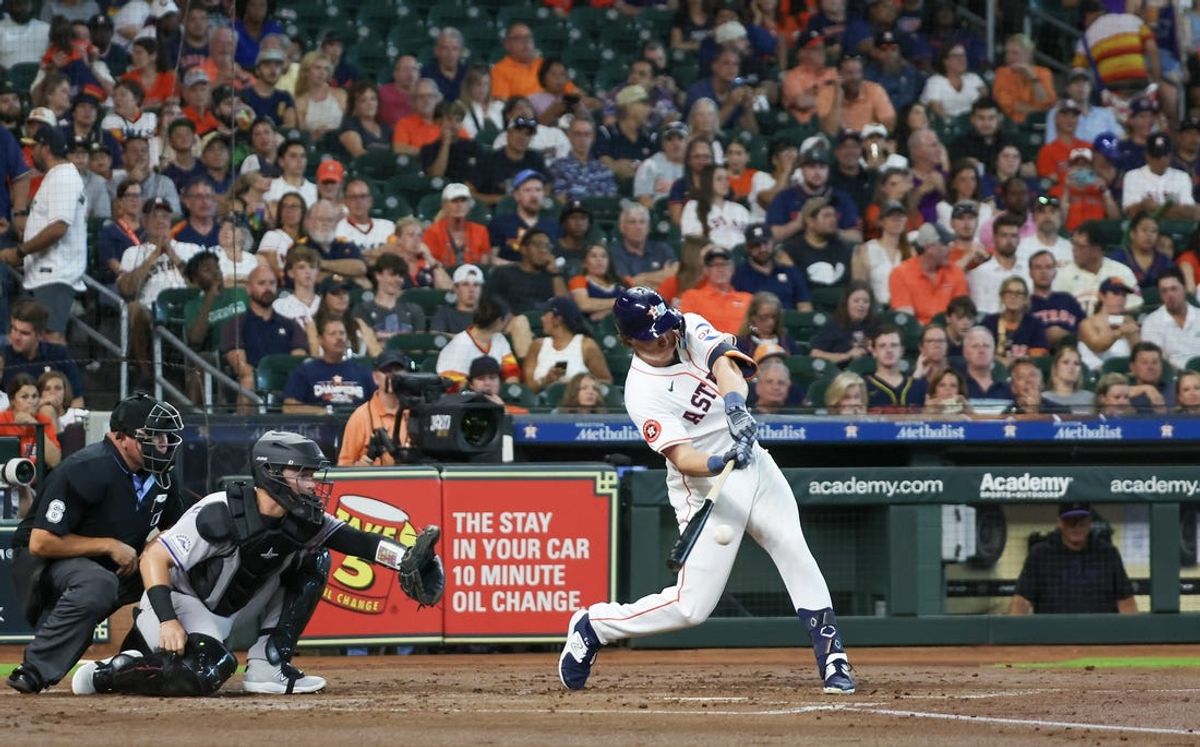 Jun 25, 2024; Houston, Texas, USA; Houston Astros center fielder Jake Meyers (6) hits a two run RBI single against the Colorado Rockies in the first inning at Minute Maid Park. Mandatory Credit: Thomas Shea-USA TODAY Sports