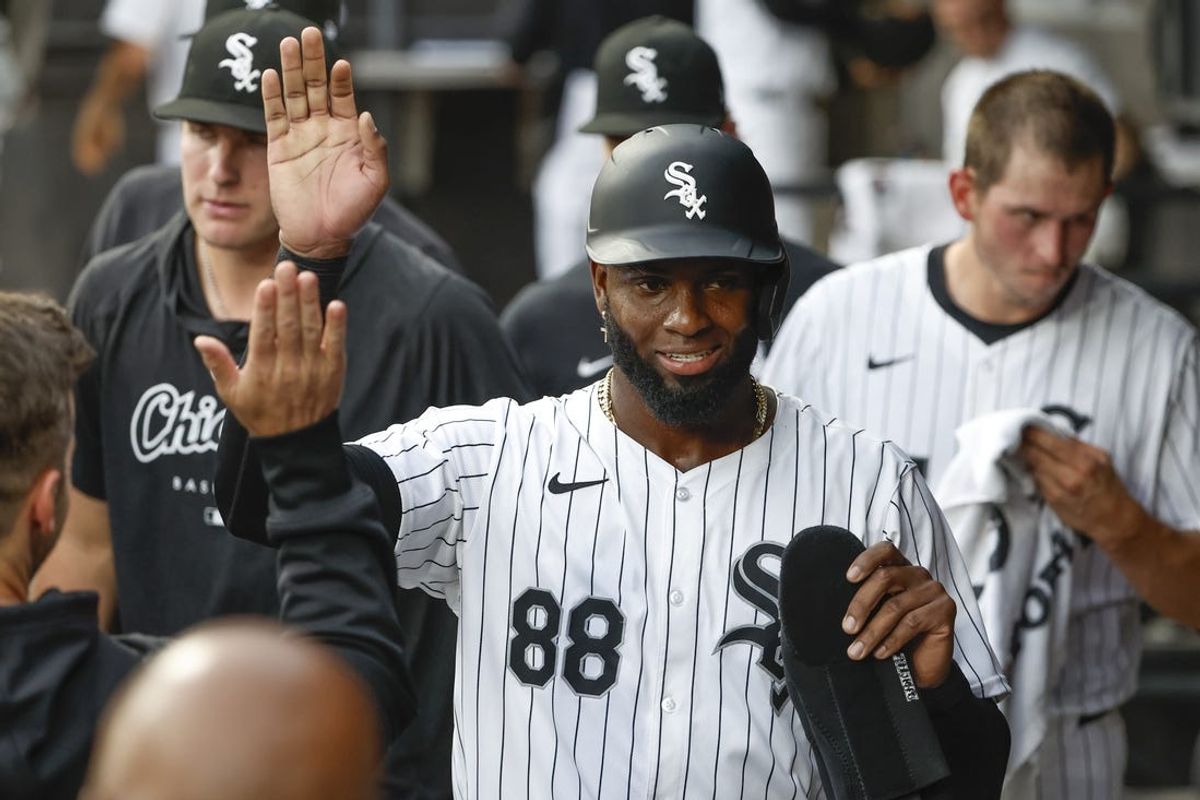 Jun 25, 2024; Chicago, Illinois, USA; Chicago White Sox outfielder Luis Robert Jr. (88) celebrates with teammates after scoring against the Los Angeles Dodgers during the first inning at Guaranteed Rate Field. Mandatory Credit: Kamil Krzaczynski-USA TODAY Sports