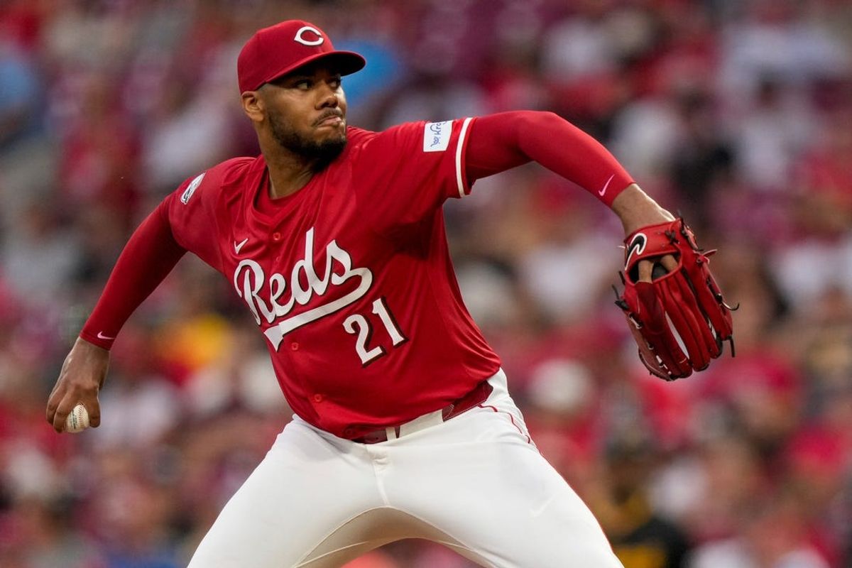 Cincinnati Reds pitcher Hunter Greene (21) throws a pitch in the first inning of the MLB National League game between the Cincinnati Reds and the Pittsburgh Pirates at Great American Ball Park on Tuesday, June 25, 2024. The Pirates won the second game of the series, 9-5.