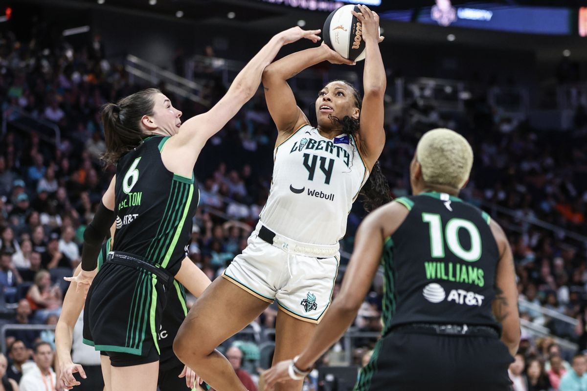 Jun 25, 2024; Belmont Park, New York, USA; New York Liberty forward Betnijah Laney-Hamilton (44) shoots over Minnesota Lynx forward Bridget Carleton (6) in the fourth quarter of the Commissioner’s Cup Championship game at UBS Arena. Mandatory Credit: Wendell Cruz-Imagn Images