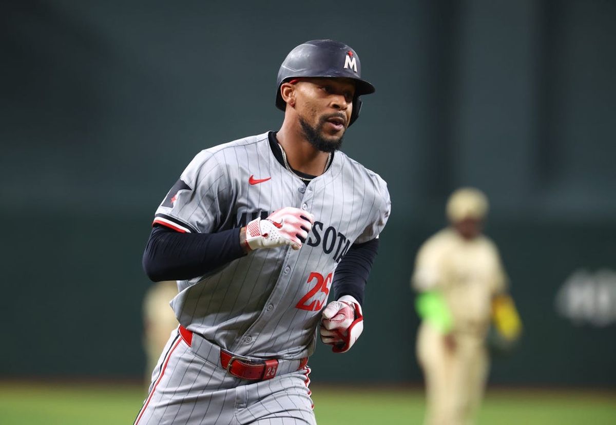 Jun 25, 2024; Phoenix, Arizona, USA; Minnesota Twins outfielder Byron Buxton rounds the bases after hitting a solo home run in the fifth inning against the Arizona Diamondbacks at Chase Field. Mandatory Credit: Mark J. Rebilas-USA TODAY Sports
