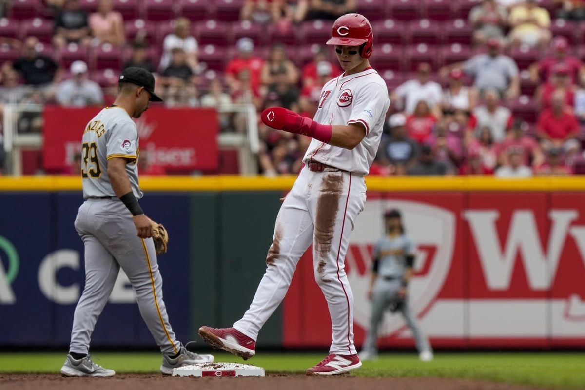 Jun 26, 2024; Cincinnati, Ohio, USA; Cincinnati Reds center fielder Stuart Fairchild (17) steps into a stolen base at second against the Pittsburgh Pirates in the second inning at Great American Ball Park. Mandatory Credit: Sam Greene/The Cincinnati Enquirer-USA TODAY Sports