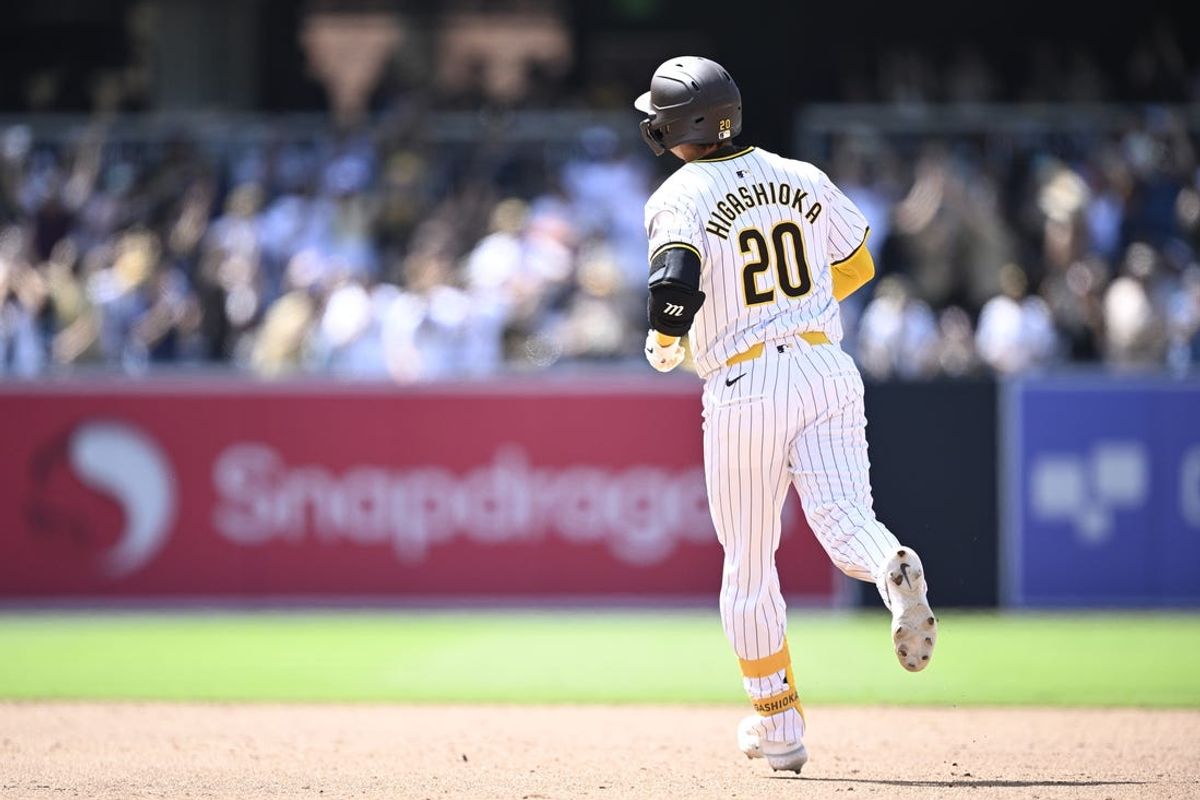 Jun 26, 2024; San Diego, California, USA; San Diego Padres catcher Kyle Higashioka (20) rounds the bases after hitting a grand slam home run against the Washington Nationals during the eighth inning at Petco Park. Mandatory Credit: Orlando Ramirez-USA TODAY Sports