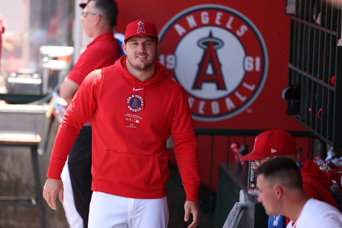 Jun 26, 2024; Anaheim, California, USA;  Los Angeles Angels center fielder Mike Trout (27) walks in the dugout during the MLB game against the Oakland Athletics at Angel Stadium. Mandatory Credit: Kiyoshi Mio-USA TODAY Sports
