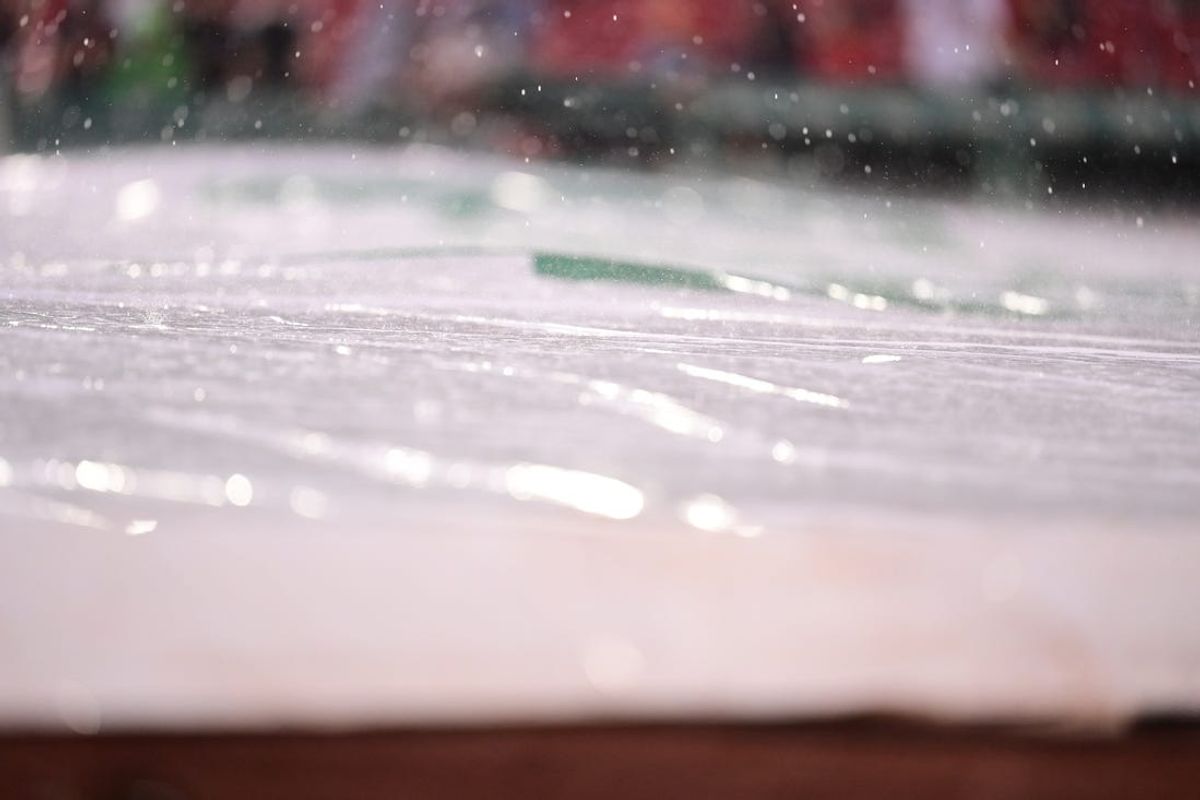 Jun 26, 2024; Boston, Massachusetts, USA; Rain delays a game between the Boston Red Sox and the Toronto Blue Jays during the first inning at Fenway Park. Mandatory Credit: Eric Canha-USA TODAY Sports