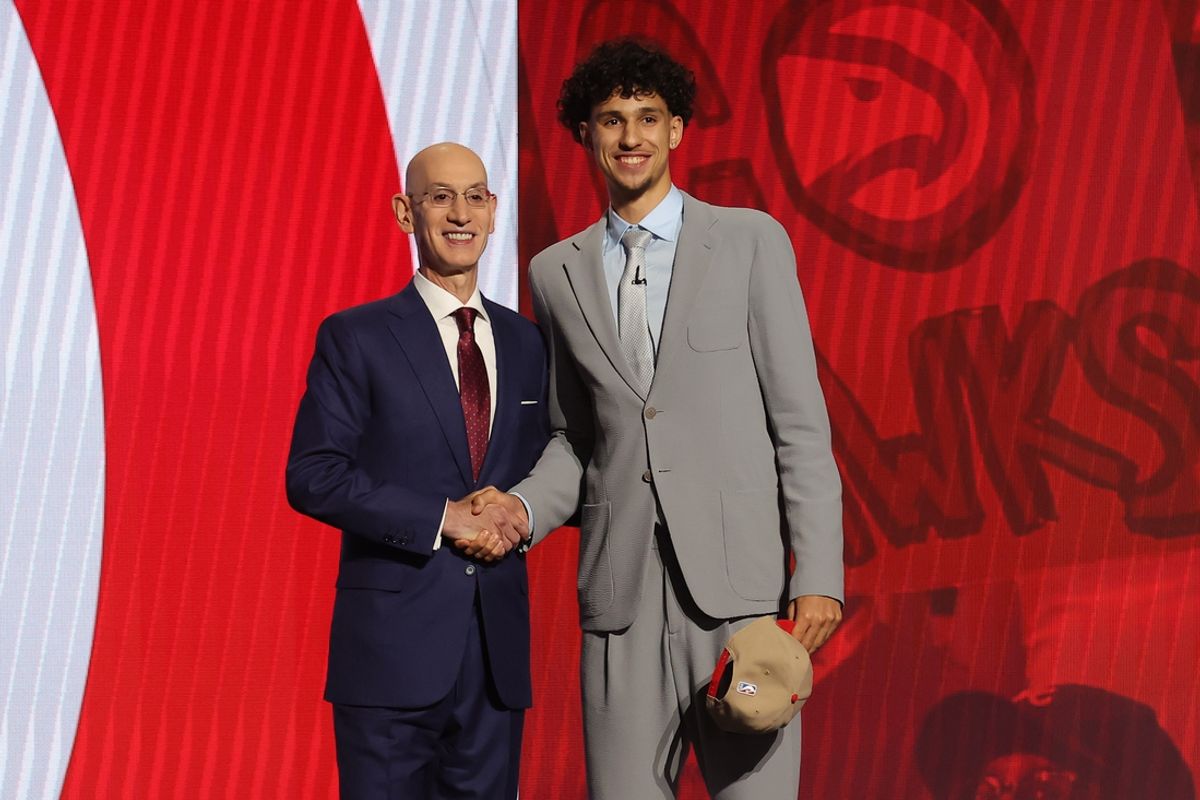 Jun 26, 2024; Brooklyn, NY, USA; Zaccharie Risacher poses for photos with NBA commissioner Adam Silver after being selected first overall by the Atlanta Hawks in the first round of the 2024 NBA Draft at Barclays Center. Mandatory Credit: Brad Penner-Imagn Images