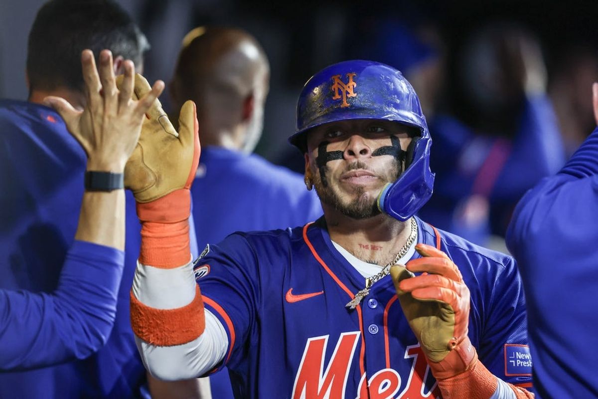 Jun 26, 2024; New York City, New York, USA;  New York Mets catcher Francisco Alvarez (4) is greeted on the dugout after hitting a two run home run in the third inning against the New York Yankees at Citi Field. Mandatory Credit: Wendell Cruz-USA TODAY Sports