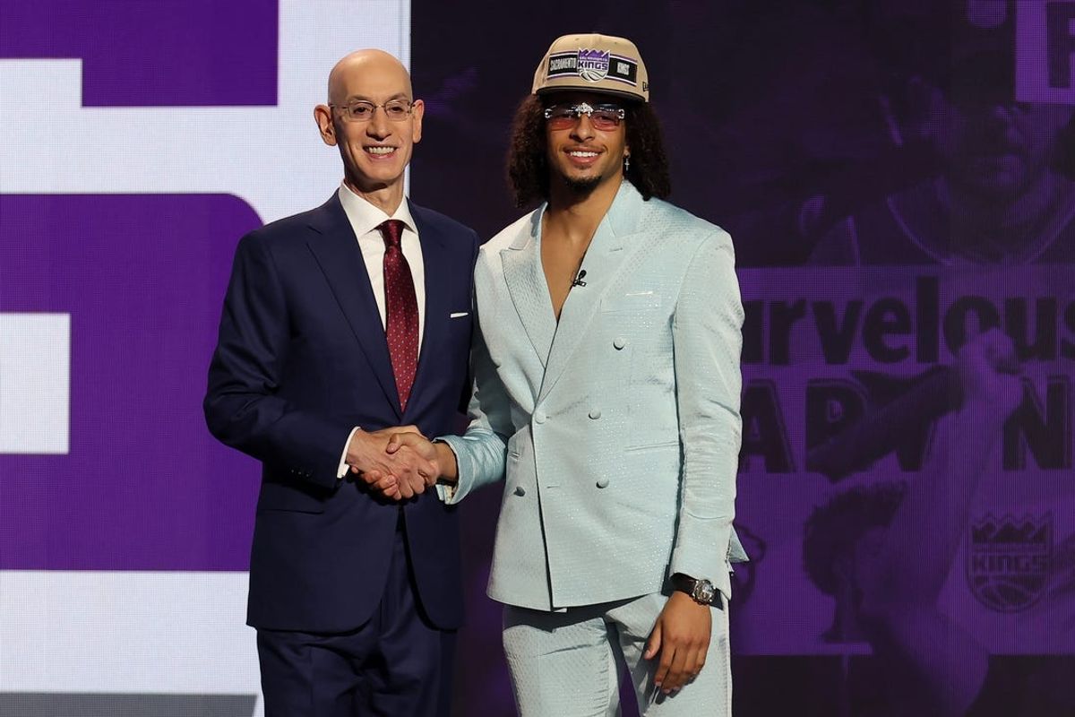 Jun 26, 2024; Brooklyn, NY, USA; Devin Carter poses for photos with NBA commissioner Adam Silver after being selected in the first round by the Sacramento Kings in the 2024 NBA Draft at Barclays Center. Mandatory Credit: Brad Penner-USA TODAY Sports