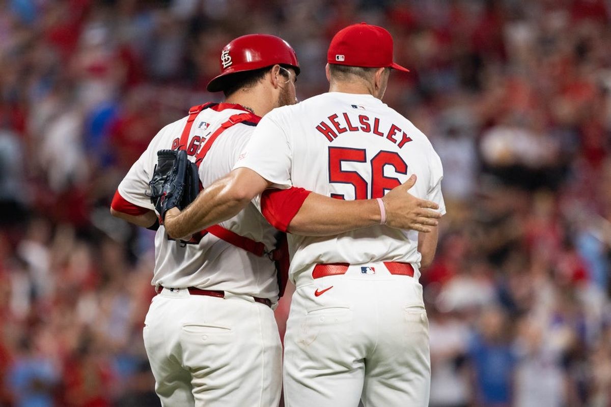 Jun 26, 2024; St. Louis, Missouri, USA; St. Louis Cardinals pitcher Ryan Helsley (56) and Willson Contreras (40) celebrate with a Cardinals 4-1 victory against the Atlanta Braves at Busch Stadium. Mandatory Credit: Zach Dalin-USA TODAY Sports