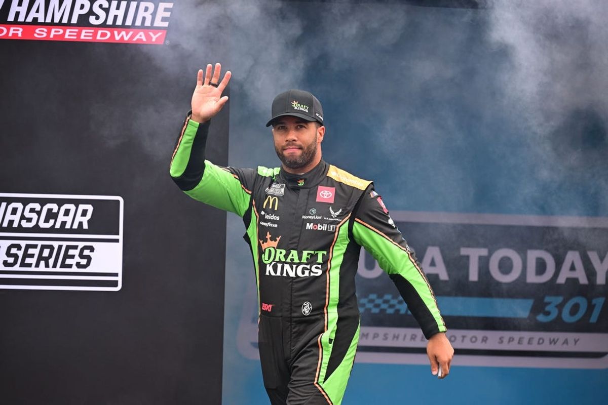 Jun 23, 2024; Loudon, New Hampshire, USA; NASCAR Cup Series driver Bubba Wallace (23) is introduced before the start of the USA TODAY 301 at New Hampshire Motor Speedway. Mandatory Credit: Eric Canha-USA TODAY Sports