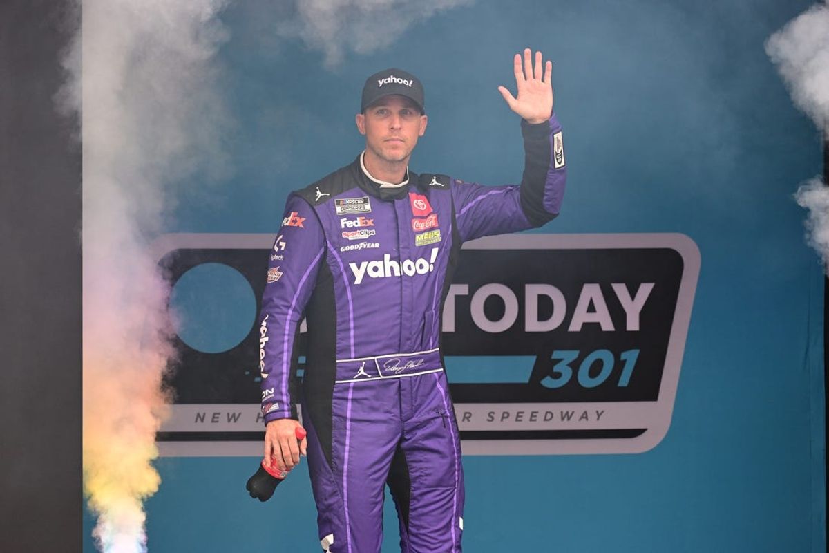 Jun 23, 2024; Loudon, New Hampshire, USA; NASCAR Cup Series driver Denny Hamlin (11) is introduced before the start of the USA TODAY 301 at New Hampshire Motor Speedway. Mandatory Credit: Eric Canha-USA TODAY Sports