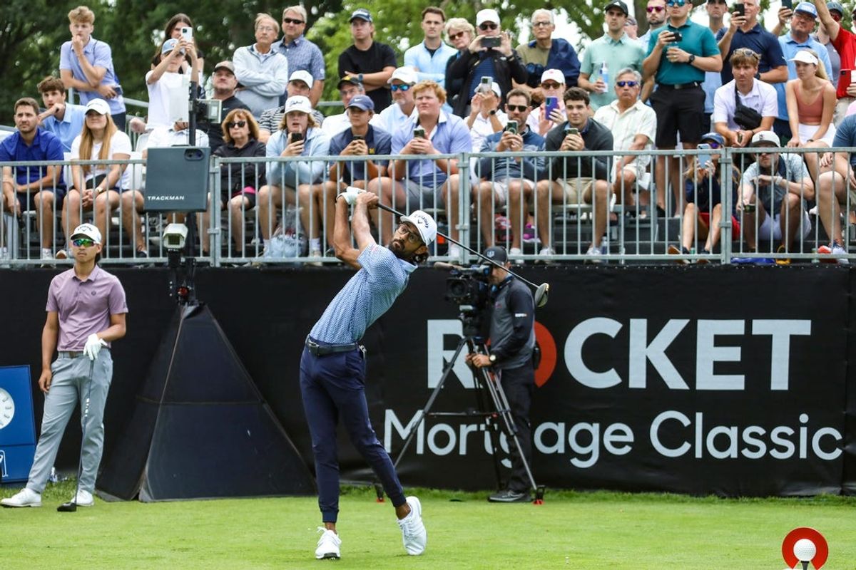 PGA golfer Akshay Bhatia hits the ball from the first tee, during round one of the Rocket Mortgage Classic at the Detroit Golf Club in Detroit on Thursday, June 27, 2024.