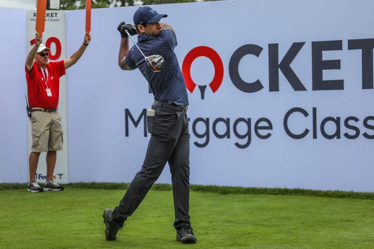 PGA golfer Aaron Rai tees off, during round one of the Rocket Mortgage Classic at the Detroit Golf Club in Detroit on Thursday, June 27, 2024. Rai finished 6-under and is the leader.