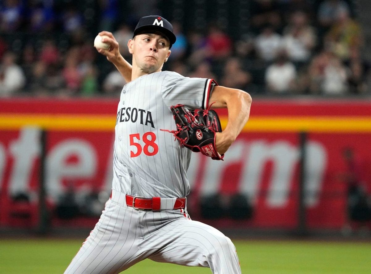Minnesota Twins pitcher David Festa throws to the Arizona Diamondbacks in the fourth inning at Chase Field in Phoenix on Thursday, June 27, 2024.