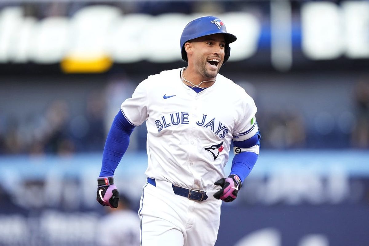 Jun 27, 2024; Toronto, Ontario, CAN; Toronto Blue Jays right fielder George Springer (4) reacts as he runs to third base on his second three-run home run of the game against the New York Yankees during the second inning at Rogers Centre. Mandatory Credit: John E. Sokolowski-USA TODAY Sports