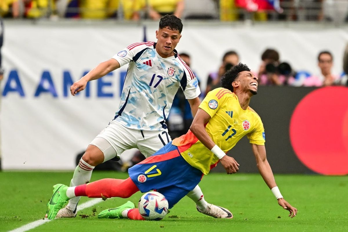 Jun 28, 2024; Glendale, AZ, USA; Costa Rica forward Warren Madrigal (17) and Colombia defender Johan Mojica (17) collide during the first half at State Farm Stadium. Mandatory Credit: Daniel Bartel-Imagn Images