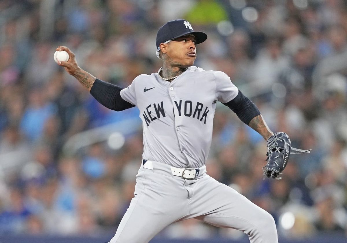 Jun 28, 2024; Toronto, Ontario, CAN; New York Yankees starting pitcher Marcus Stroman (0) throws a pitch against the Toronto Blue Jays during the first inning at Rogers Centre. Mandatory Credit: Nick Turchiaro-USA TODAY Sports