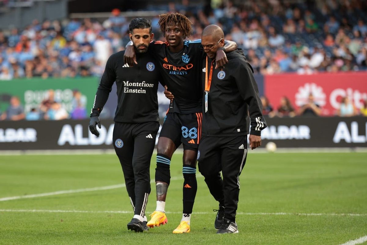 Jun 28, 2024; New York, New York, USA; New York City FC forward Malachi Jones (88) is helped off the field by medical staff in the first half against the Orlando City at Yankee Stadium. Mandatory Credit: Vincent Carchietta-USA TODAY Sports