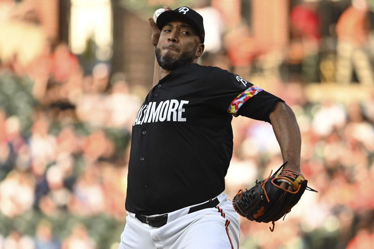 Jun 28, 2024; Baltimore, Maryland, USA; Baltimore Orioles pitcher Albert Suárez (49) throws a first inning pitch against the Texas Rangers  at Oriole Park at Camden Yards. Mandatory Credit: Tommy Gilligan-USA TODAY Sports