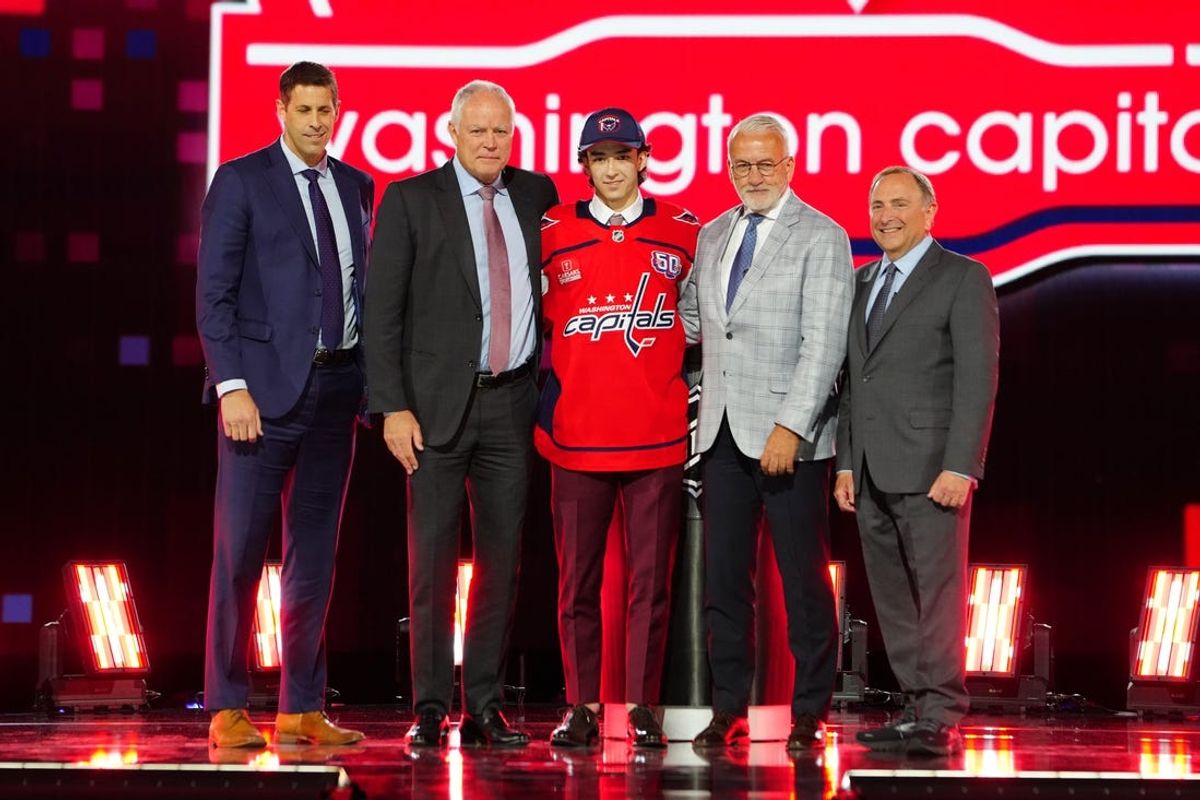 Jun 28, 2024; Las Vegas, Nevada, USA; Terik Parascak is selected by the Washington Capitals with the 17th overall pick in the first round of the 2024 NHL Draft at The Sphere. Mandatory Credit: Stephen R. Sylvanie-USA TODAY Sports