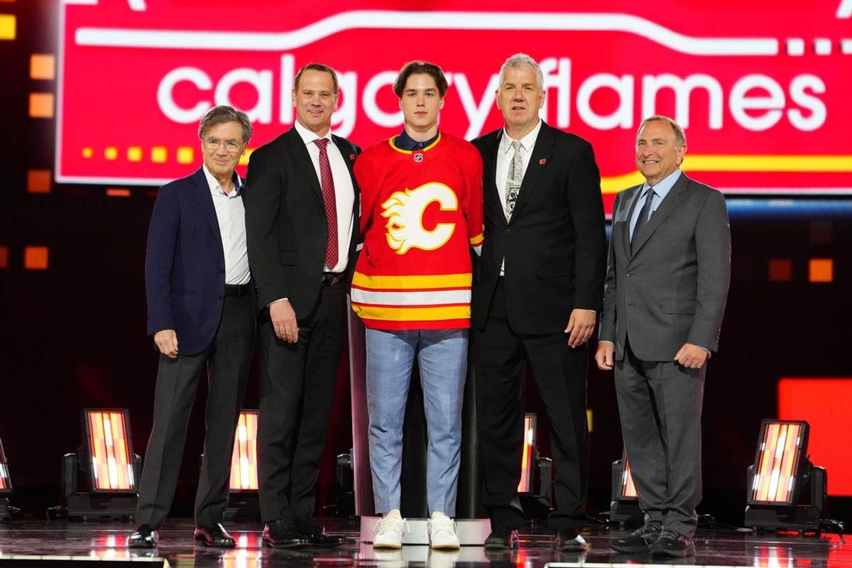Jun 28, 2024; Las Vegas, Nevada, USA; Matvei Gridin is selected by the Calgary Flames with the 28th overall pick in the first round of the 2024 NHL Draft at The Sphere. Mandatory Credit: Stephen R. Sylvanie-USA TODAY Sports