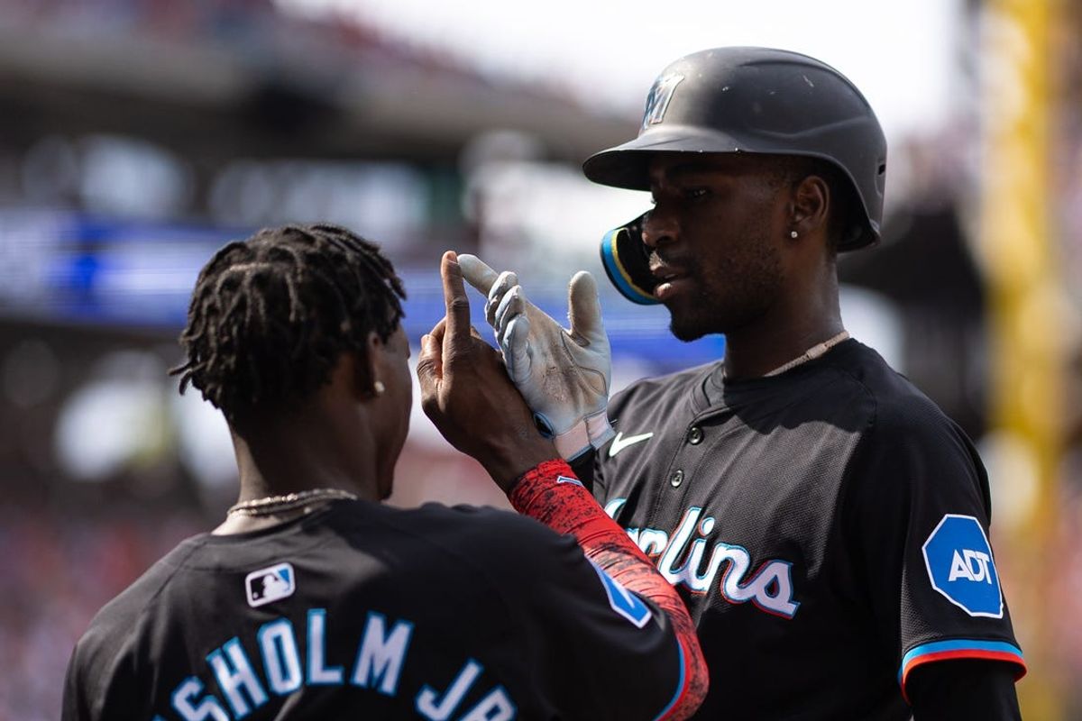 Jun 29, 2024; Philadelphia, Pennsylvania, USA; Miami Marlins outfielder Nick Gordon (1) celebrates with outfielder Jazz Chisholm Jr. (2) after hitting a home run during the second inning against the Philadelphia Phillies at Citizens Bank Park. Mandatory Credit: Bill Streicher-USA TODAY Sports