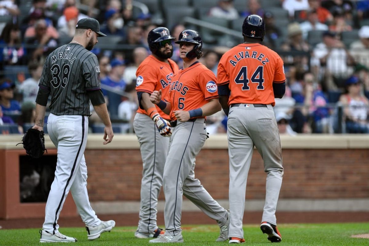 Jun 29, 2024; New York City, New York, USA; Houston Astros outfielder Jake Meyers (6) and Houston Astros outfielder Yordan Alvarez (44) score on a two RBI double by Houston Astros shortstop Jeremy Peña (not pictured) during the fourth inning against the New York Mets at Citi Field. Mandatory Credit: John Jones-USA TODAY Sports