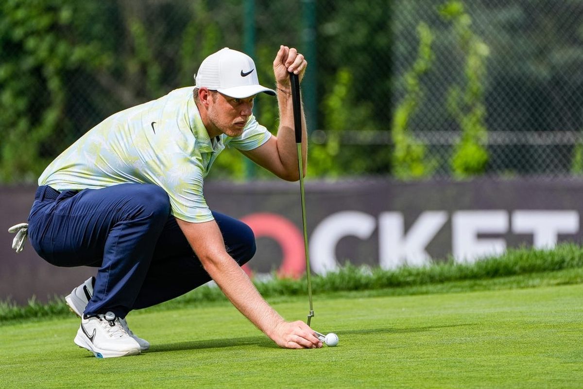 Cam Davis lines up a putt on 8th green during Round 3 of Rocket Mortgage Classic at Detroit Golf Club in Detroit on Saturday, June 29, 2024.