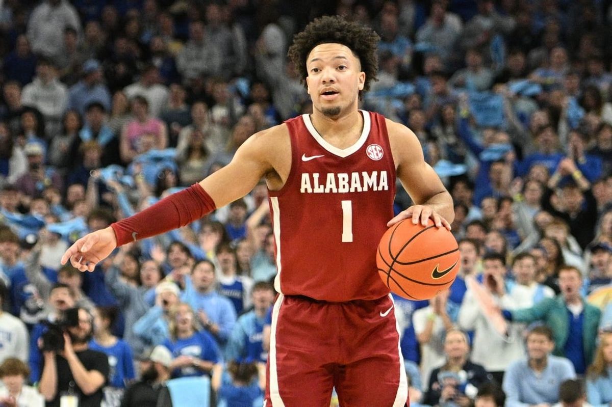 Dec 16, 2023; Omaha, Nebraska, USA;  Alabama Crimson Tide guard Mark Sears (1) dribbles against the Creighton Bluejays in the first half  at CHI Health Center Omaha.
