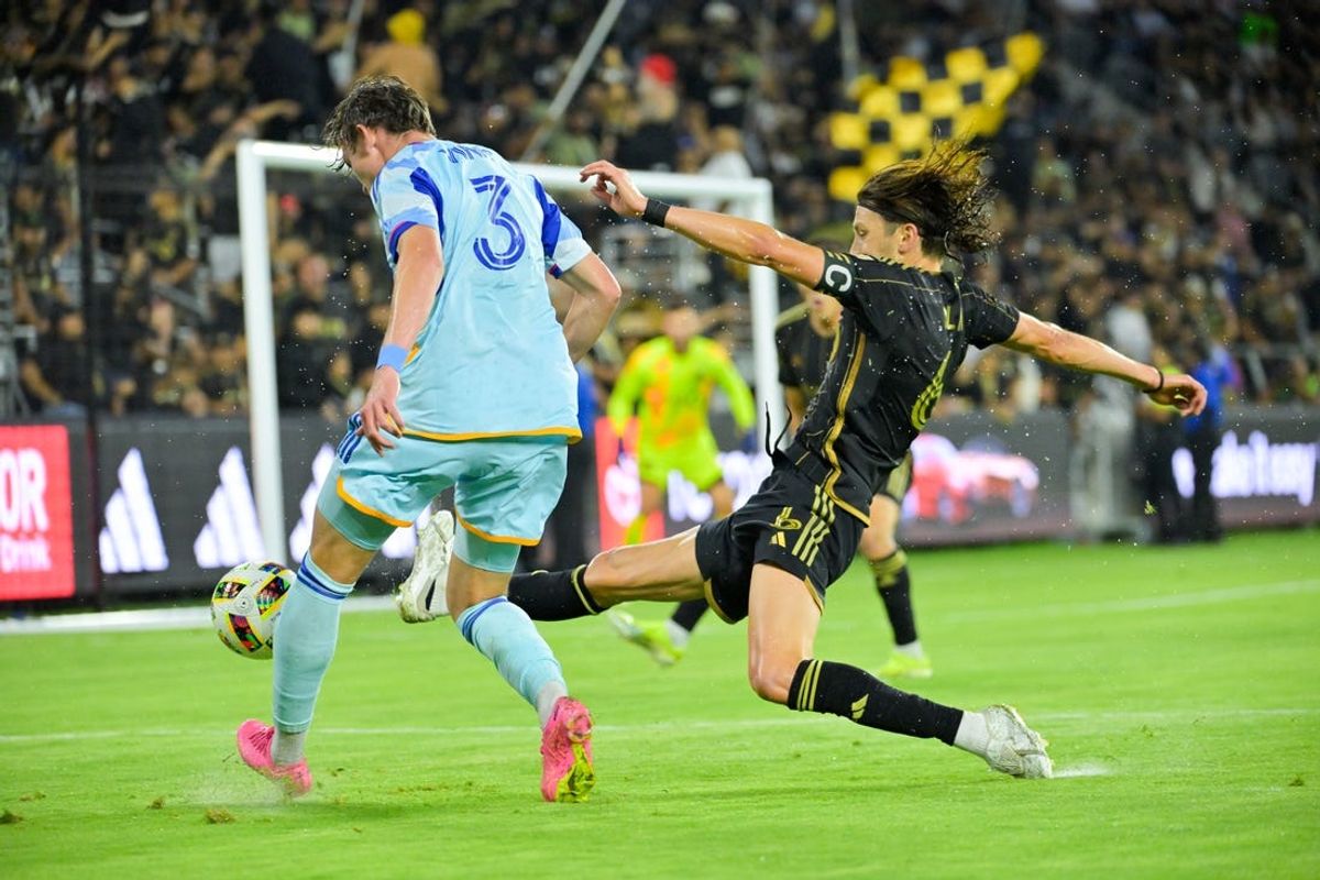 Jun 29, 2024; Los Angeles, California, USA; LAFC midfielder Ilie Sanchez (6) and Colorado Rapids defender Sam Vines (3) battle for the ball during the first half at BMO Stadium. Mandatory Credit: Jayne Kamin-Oncea-USA TODAY Sports