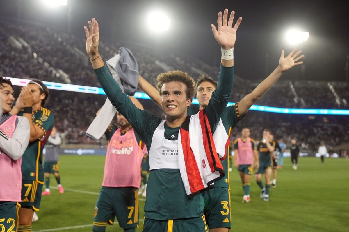 Jun 29, 2024; San Jose, California, USA; LA Galaxy midfielder Riqui Puig (10) celebrates after the match against the San Jose Earthquakes at Stanford Stadium. Mandatory Credit: Darren Yamashita-USA TODAY Sports