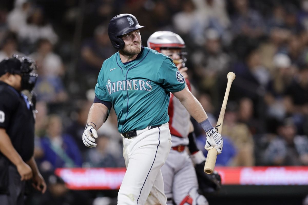 Jun 29, 2024; Seattle, Washington, USA; Seattle Mariners left fielder Luke Raley (20) walks away after striking out against the Minnesota Twins during the ninth inning at T-Mobile Park. Mandatory Credit: John Froschauer-USA TODAY Sports
