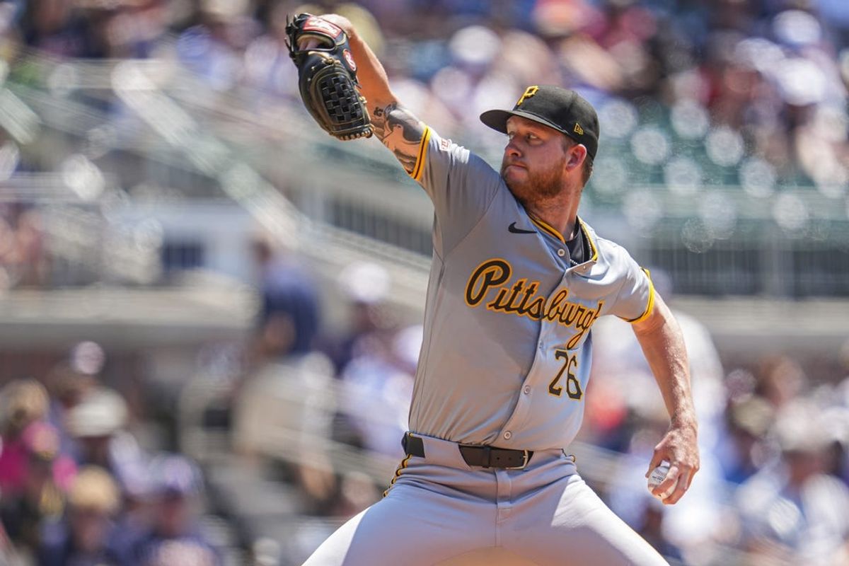 Jun 30, 2024; Cumberland, Georgia, USA; Pittsburgh Pirates starting pitcher Bailey Falter (26) pitches against the Atlanta Braves during the second inning at Truist Park. Mandatory Credit: Dale Zanine-USA TODAY Sports