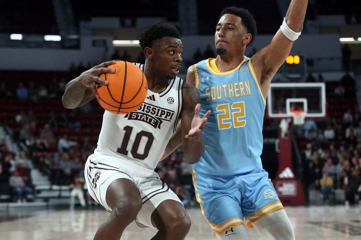 Dec 3, 2023; Starkville, Mississippi, USA; Mississippi State Bulldogs guard Dashawn Davis (10) drives to the basket as Southern Jaguars guard Antoine Jacks (2) defends during the second half at Humphrey Coliseum.
