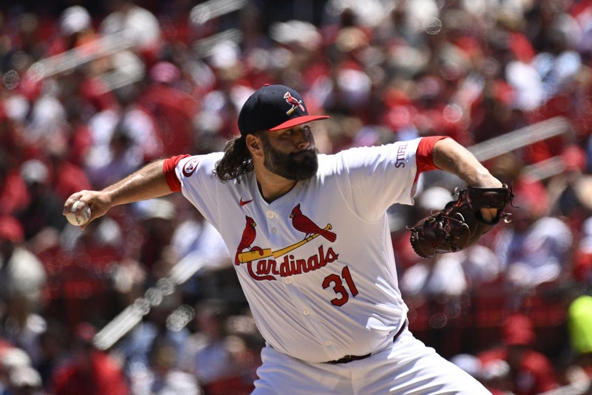 Jun 30, 2024; St. Louis, Missouri, USA; St. Louis Cardinals pitcher Lance Lynn (31) throws against the Cincinnati Reds during the first inning at Busch Stadium. Mandatory Credit: Jeff Le-USA TODAY Sports