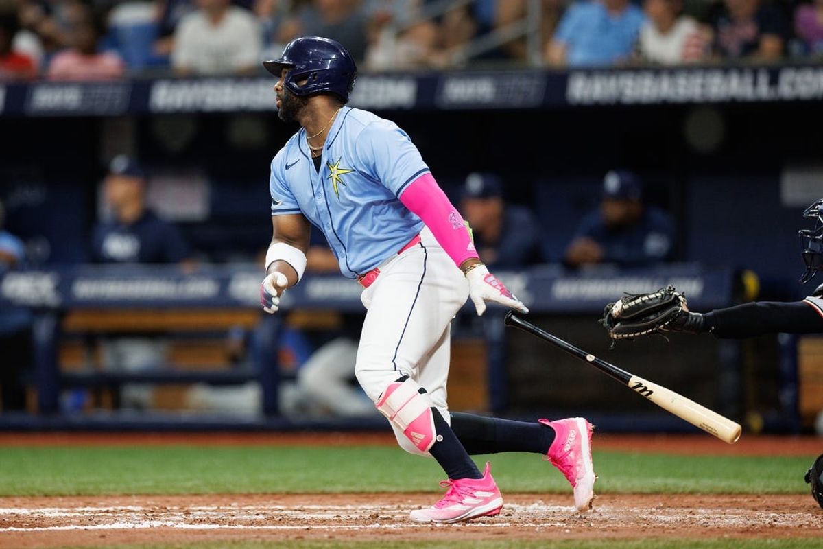 Jun 30, 2024; St. Petersburg, Florida, USA;  Tampa Bay Rays designated hitter Yandy Diaz (2) doubles against the Washington Nationals in the fifth inning at Tropicana Field. Mandatory Credit: Nathan Ray Seebeck-USA TODAY Sports