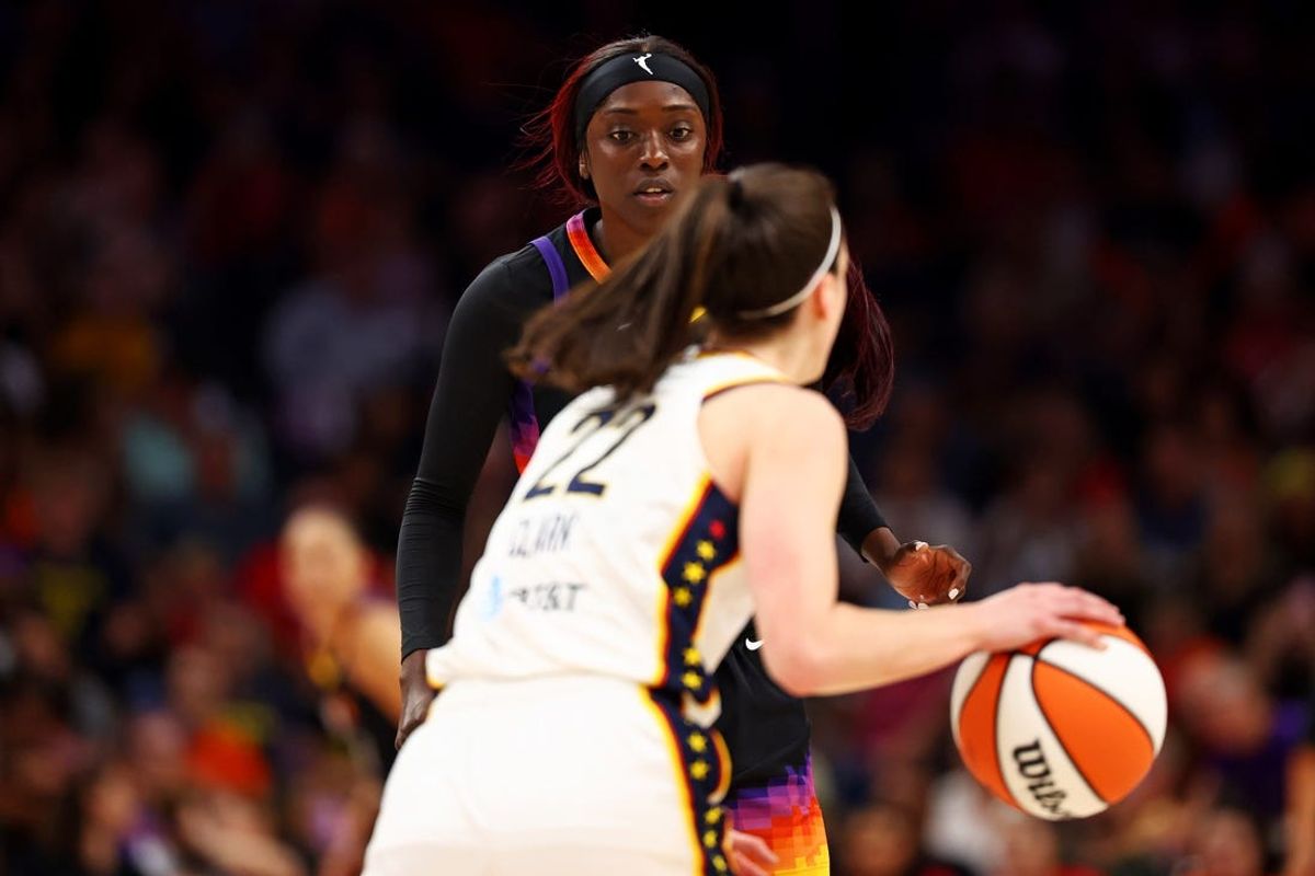 Jun 30, 2024; Phoenix, Arizona, USA; Phoenix Mercury guard Kahleah Copper (2) guards Indiana Fever guard Caitlin Clark (22) during the first half at Footprint Center. Mandatory Credit: Mark J. Rebilas-USA TODAY Sports
