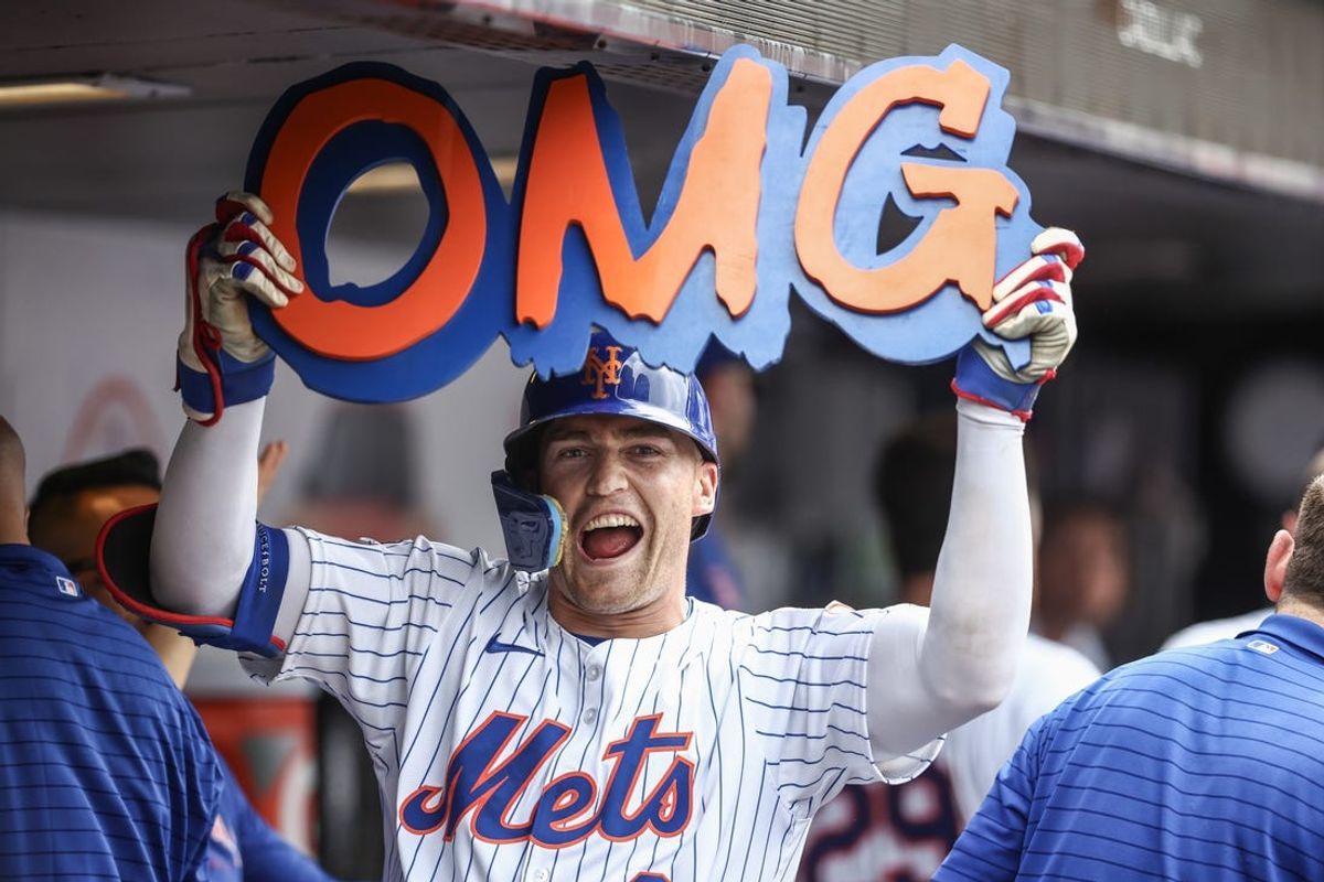 Jun 30, 2024; New York City, New York, USA;  New York Mets center fielder Brandon Nimmo (9) celebrates in the dugout after hitting a two run home run to tie the game in the seventh inning against the Houston Astros at Citi Field. Mandatory Credit: Wendell Cruz-USA TODAY Sports