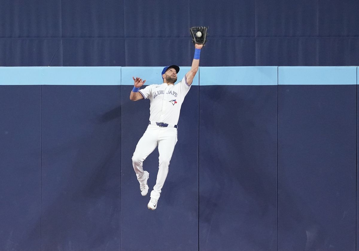 Jun 30, 2024; Toronto, Ontario, CAN; Toronto Blue Jays center fielder Kevin Kiermaier (39) catches a fly ball for the second out against the New York Yankees during the eighth inning at Rogers Centre. Mandatory Credit: Nick Turchiaro-USA TODAY Sports