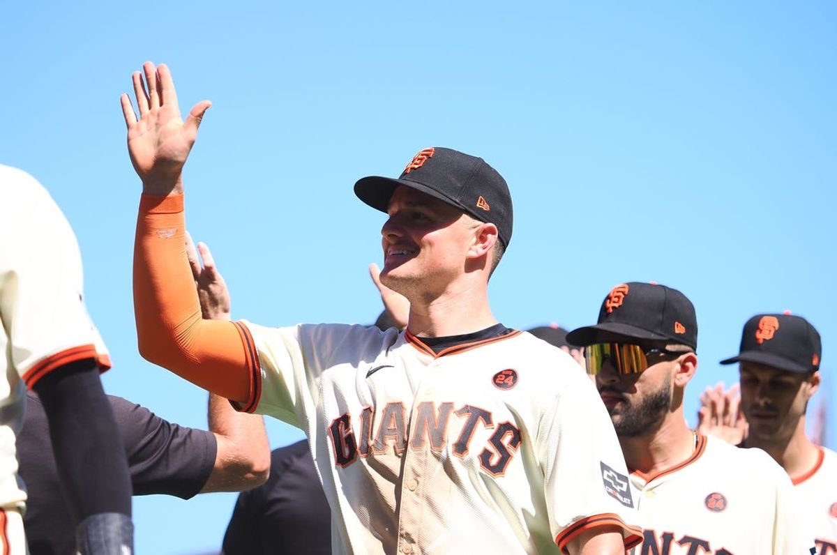 Jun 30, 2024; San Francisco, California, USA; San Francisco Giants third baseman Matt Chapman (26) high fives teammates after the game against the Los Angeles Dodgers at Oracle Park. Mandatory Credit: Kelley L Cox-USA TODAY Sports