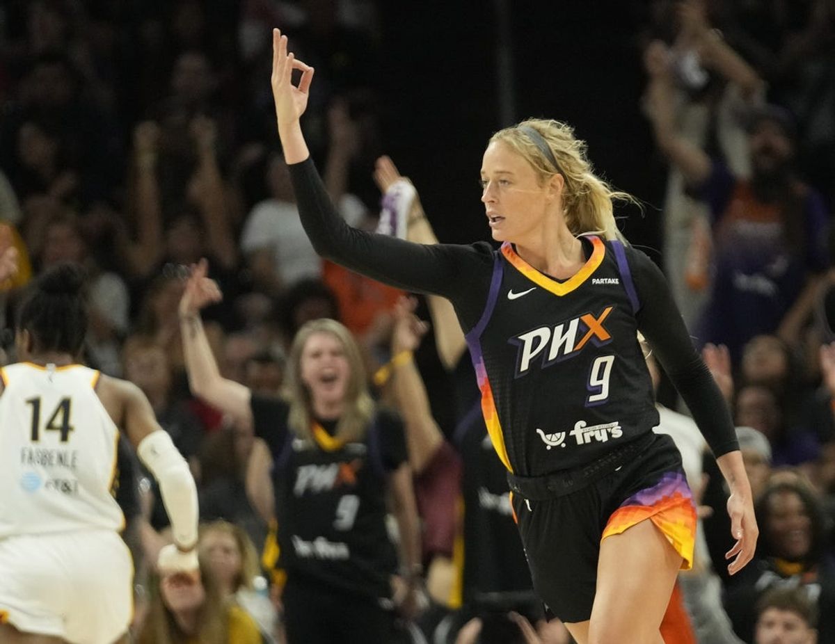 Jun 30, 2024; Phoenix, Ariz., U.S.; Phoenix Mercury guard Sophie Cunningham (9) celebrates a three point basket against the Indiana Fever during the fourth quarter at Footprint Center.