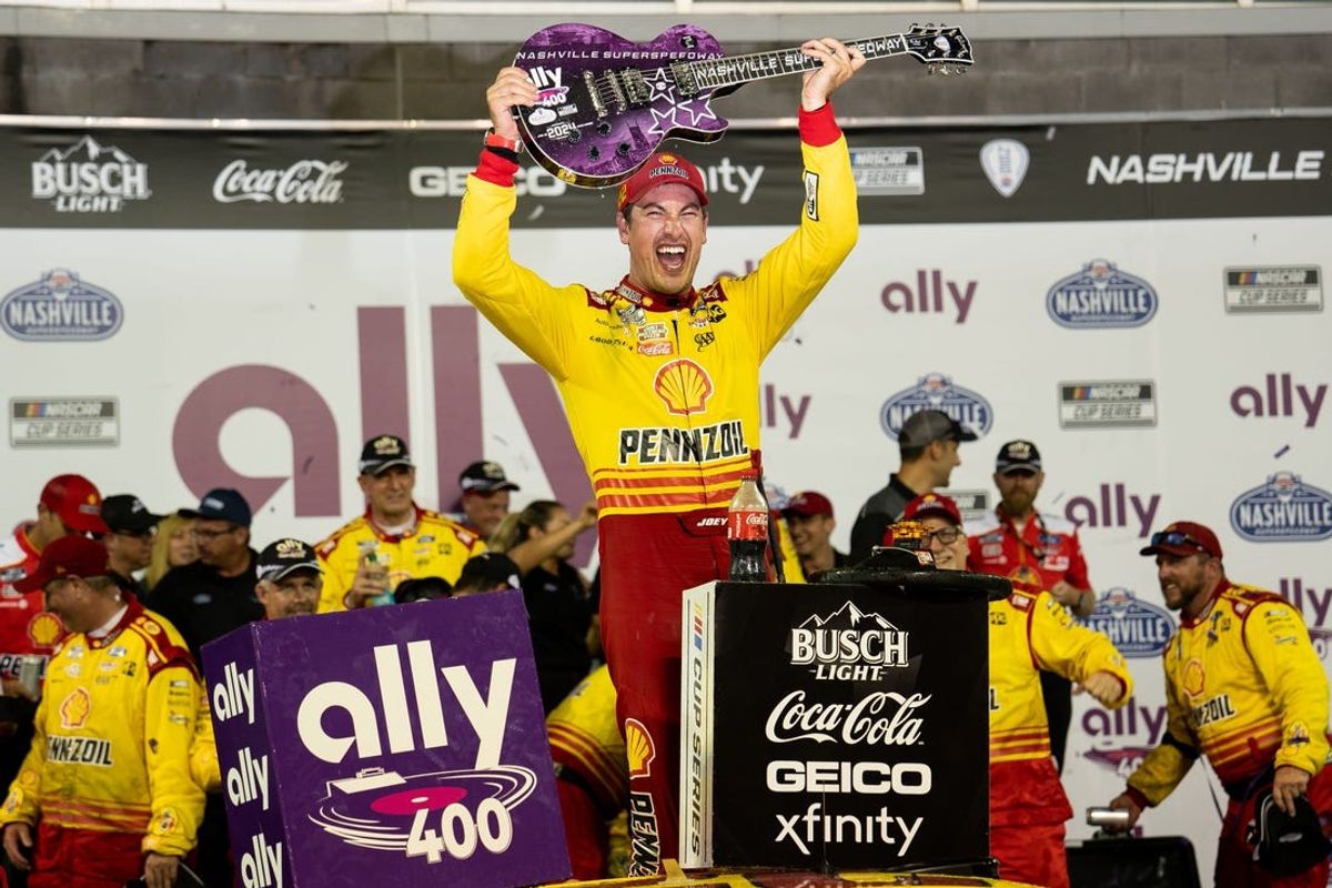 NASCAR Cup Series driver Joey Logano celebrates winning the Ally 400 at Nashville Superspeedway in Lebanon, Tenn., Sunday, June 30, 2024.
