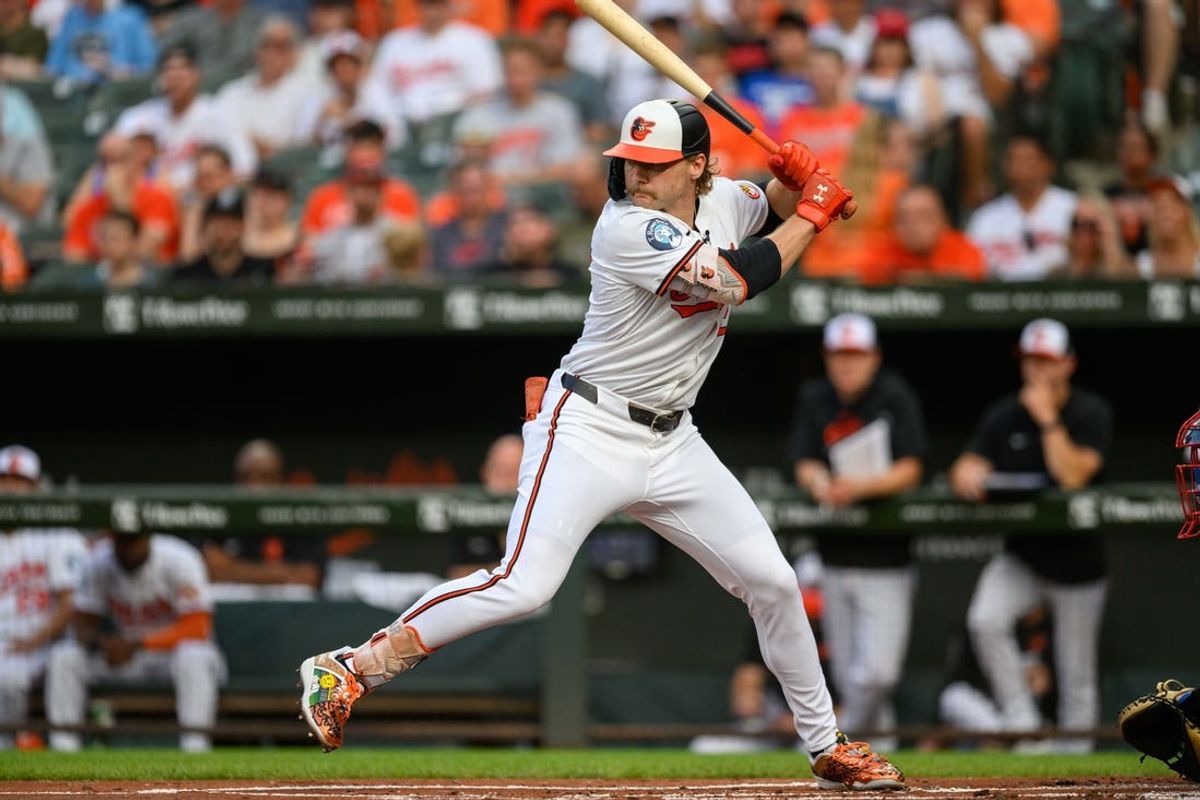 Jun 30, 2024; Baltimore, Maryland, USA; Baltimore Orioles shortstop Gunnar Henderson (2) at bat during the first inning against the Texas Rangers at Oriole Park at Camden Yards. Mandatory Credit: Reggie Hildred-USA TODAY Sports