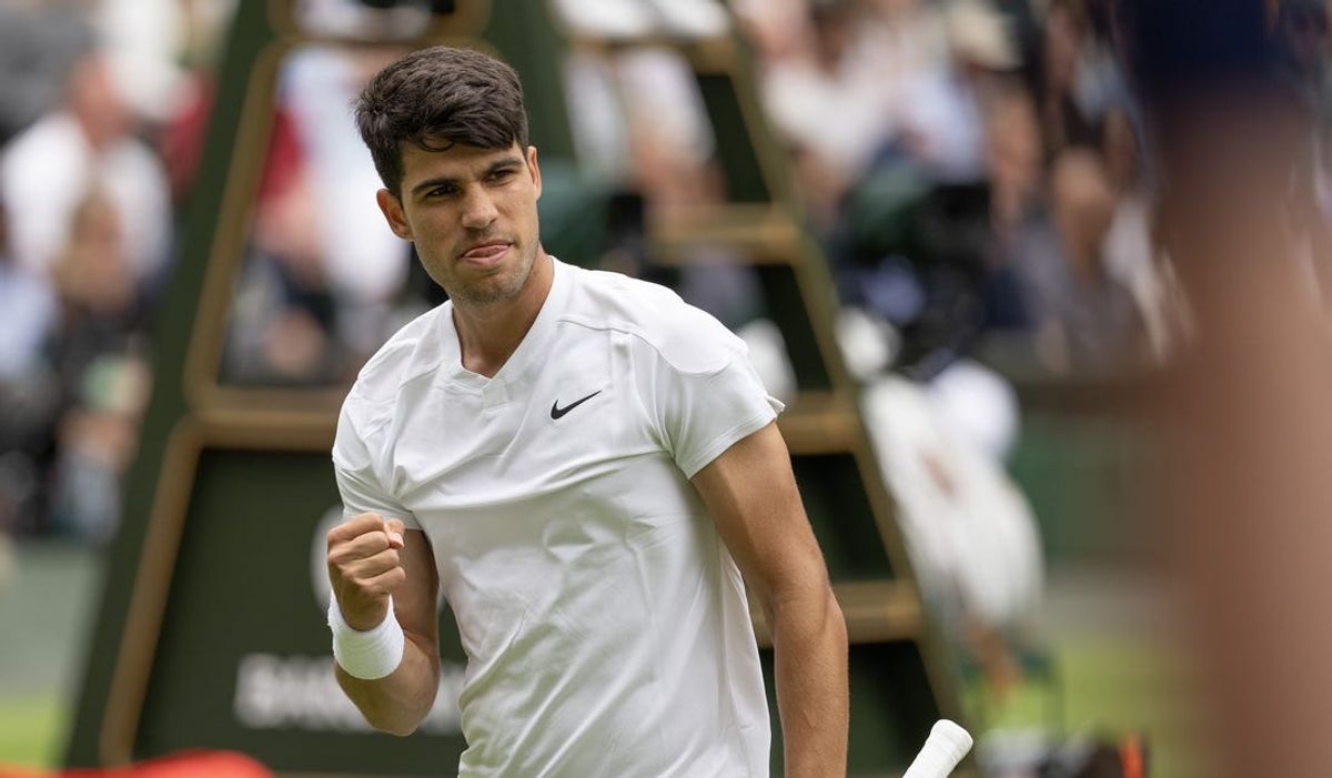 Jul 1, 2024; London, United Kingdom; Carlos Alcaraz of Spain reacts to a point during his match against Mark Lajal of Estonia (not shown) on day one of The Championships at All England Lawn Tennis and Croquet Club. Mandatory Credit: Susan Mullane-USA TODAY Sports