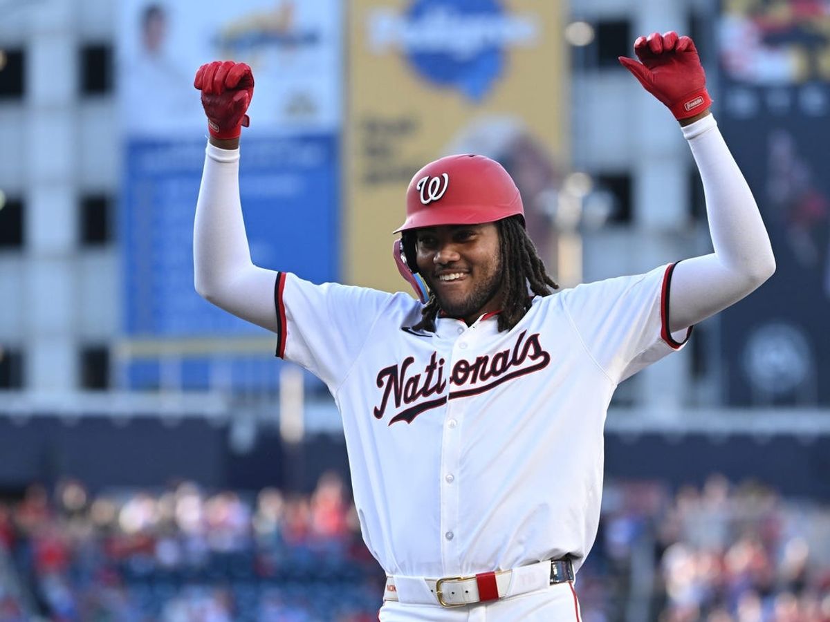 Jul 1, 2024; Washington, District of Columbia, USA; Washington Nationals center fielder James Wood (50) celebrates on first base after a base hit during his first Major League at bat against the New York Mets during the second inning at Nationals Park. Mandatory Credit: Rafael Suanes-USA TODAY Sports