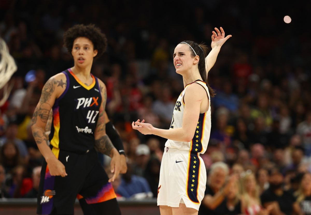 Jun 30, 2024; Phoenix, Arizona, USA; Indiana Fever guard Caitlin Clark (22) against Phoenix Mercury center Brittney Griner (42) during a WNBA game at Footprint Center. Mandatory Credit: Mark J. Rebilas-USA TODAY Sports