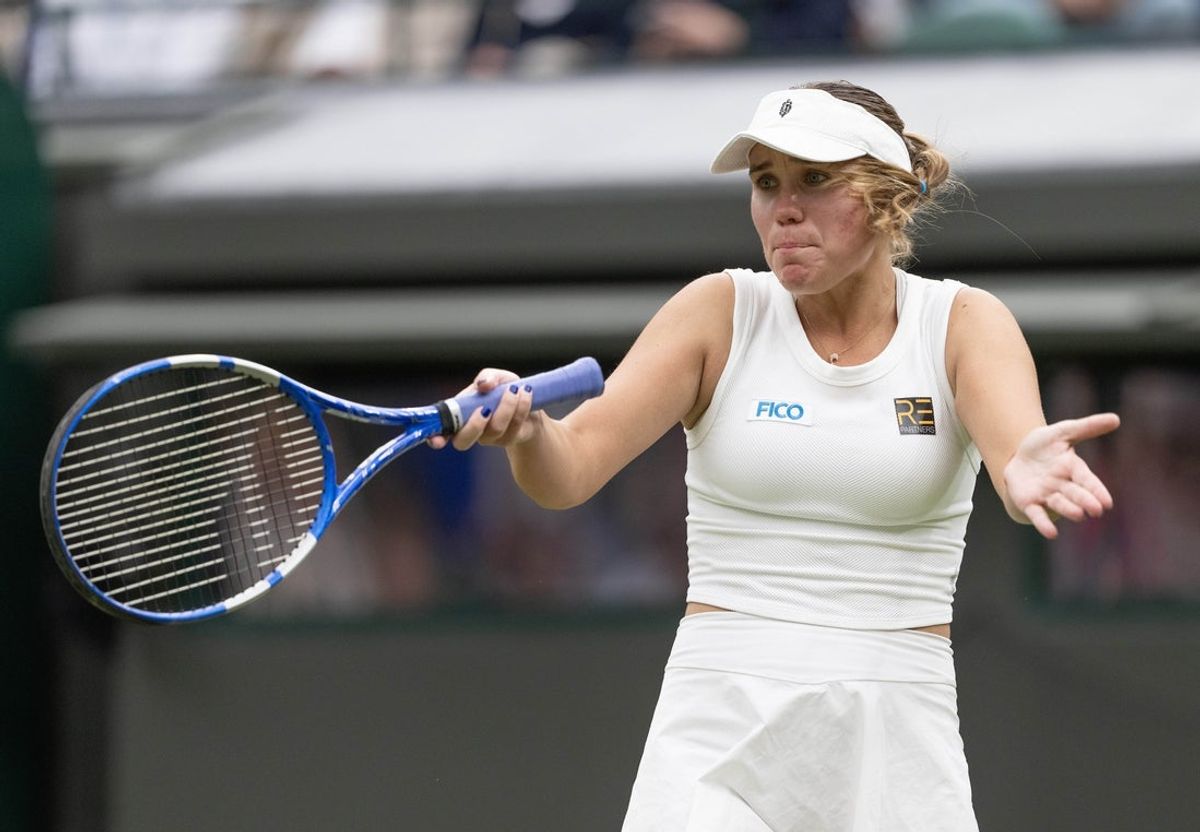 Jul 2, 2024; London, United Kingdom; Sofia Kenin of the United States reacts to a point during her match against Iga Swiatek of Poland on day two of The Championships at All England Lawn Tennis and Croquet Club. Mandatory Credit: Susan Mullane-Imagn Images